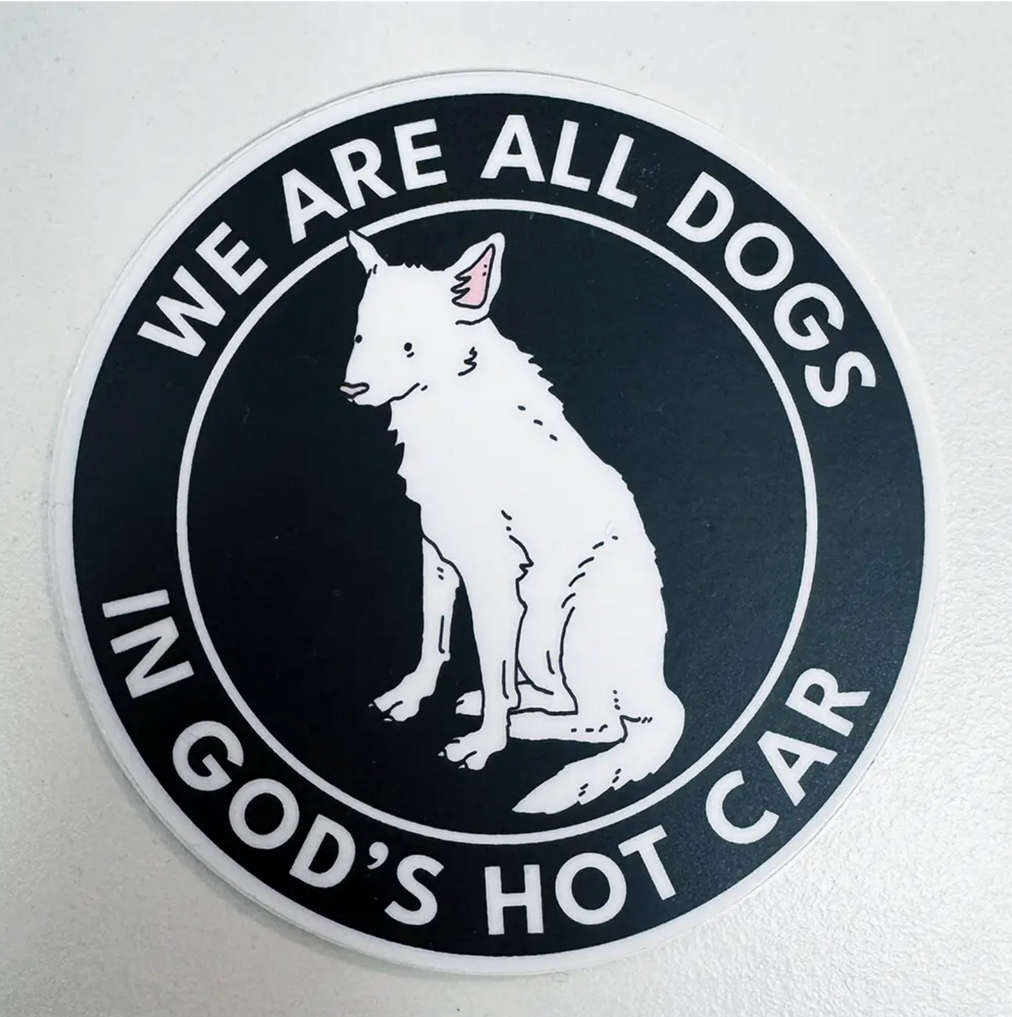 We Are All Dogs In God's Hot Car Sticker