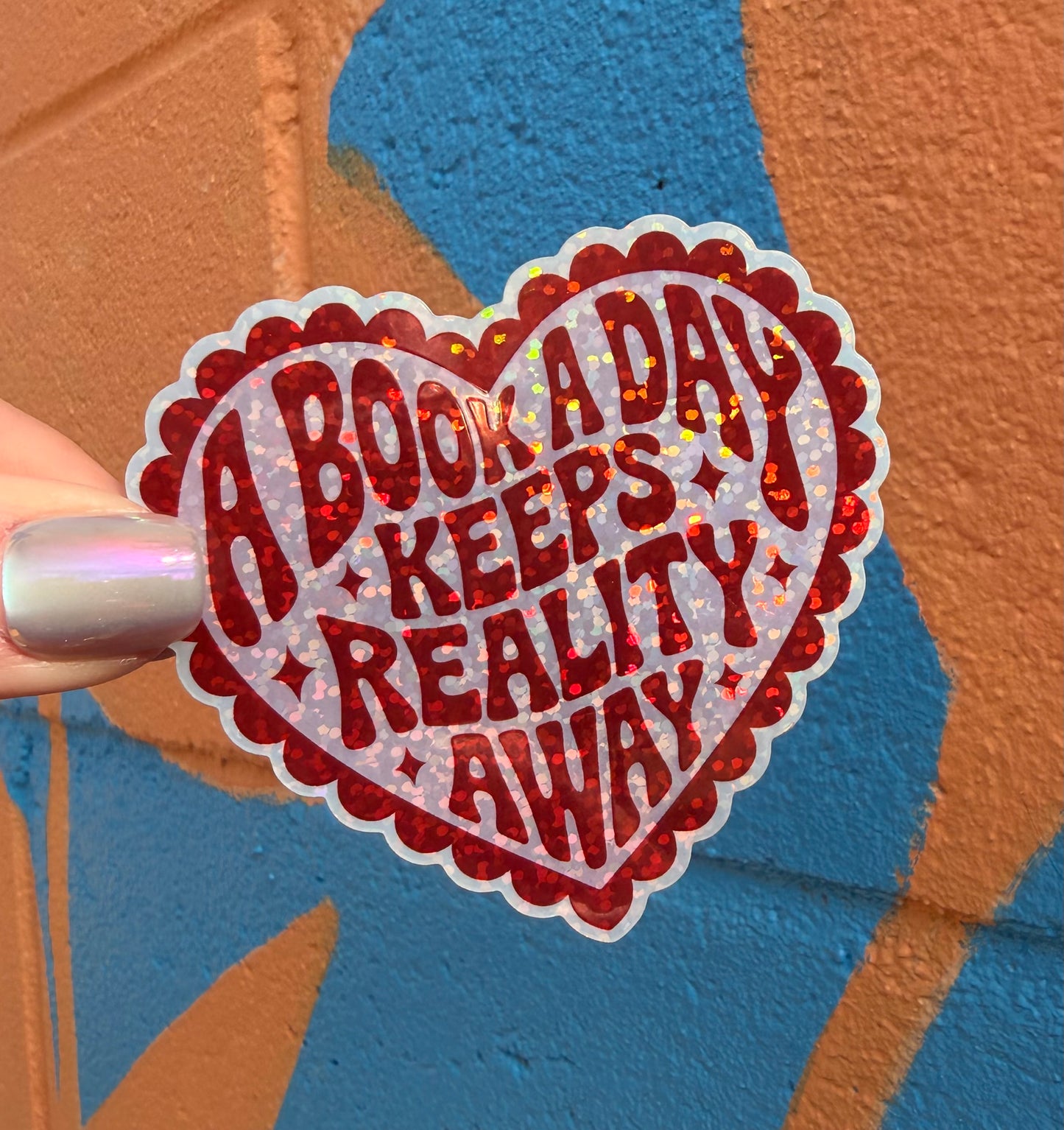 A Book A Day Keeps Reality Away Glitter Sticker