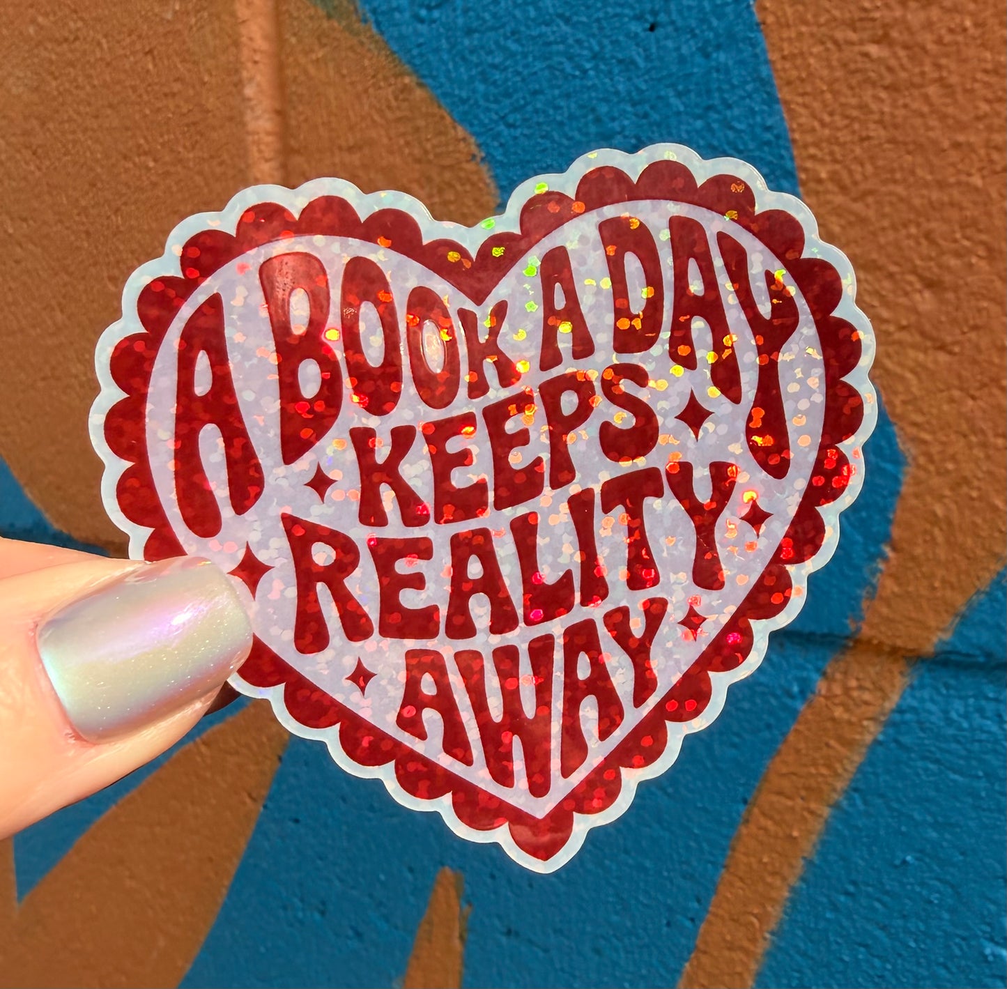 A Book A Day Keeps Reality Away Glitter Sticker