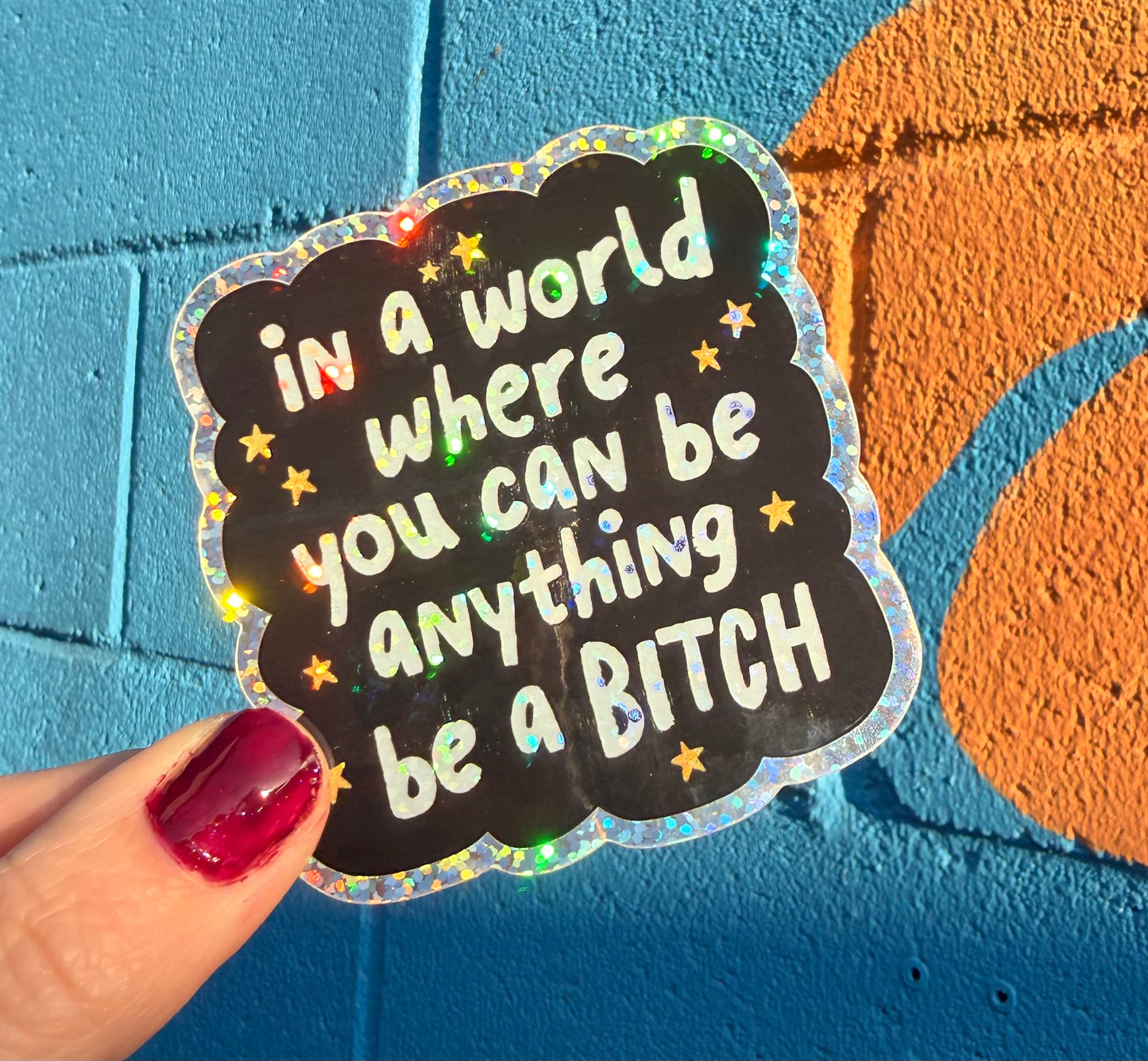 In A World Where You Can Be Anything Be A Bitch Glitter Sticker