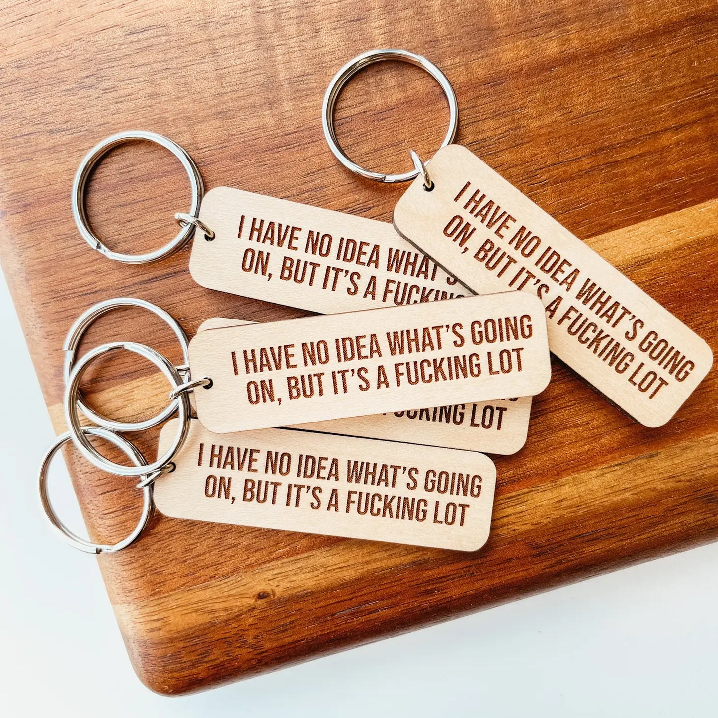 Load image into Gallery viewer, It&amp;#39;s A Fucking Lot Wooden Keychain
