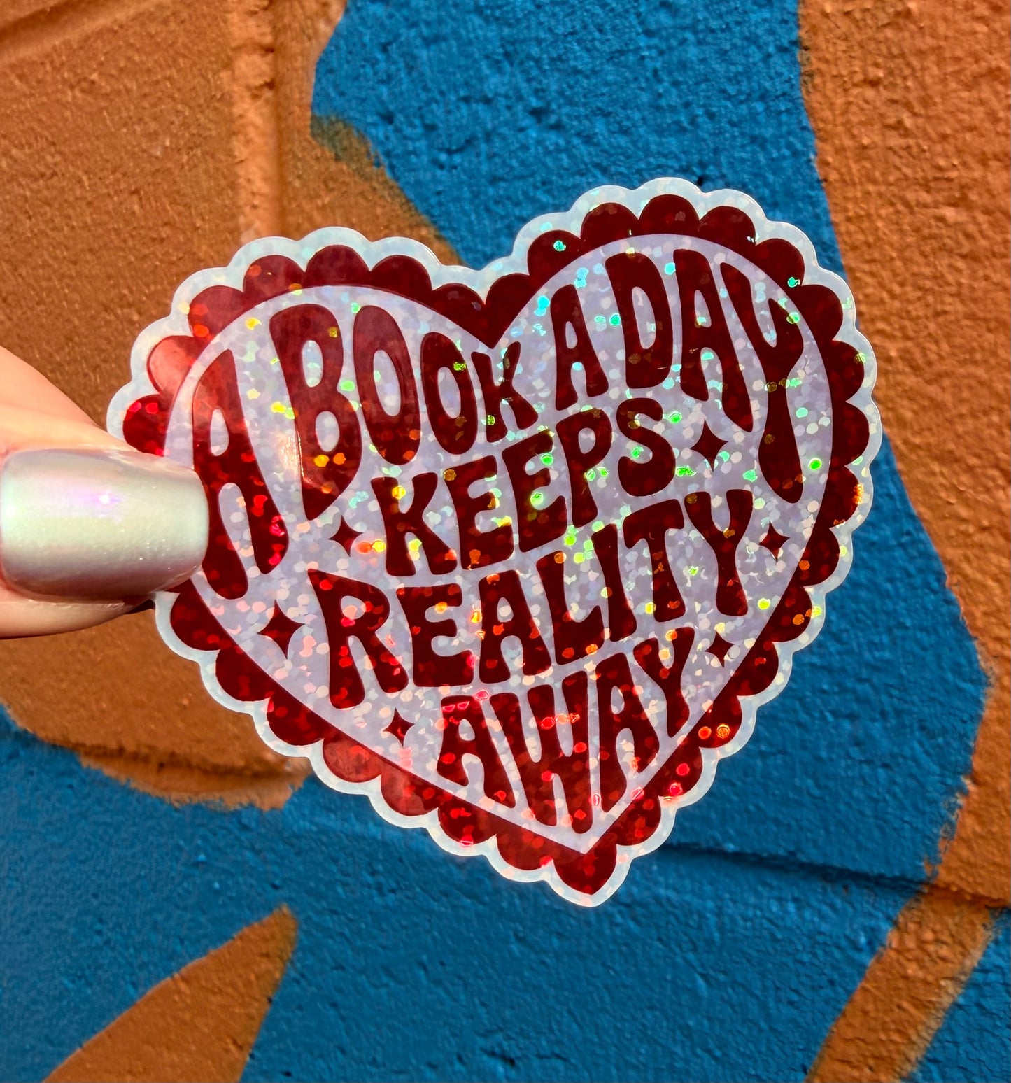 A Book A Day Keeps Reality Away Glitter Sticker