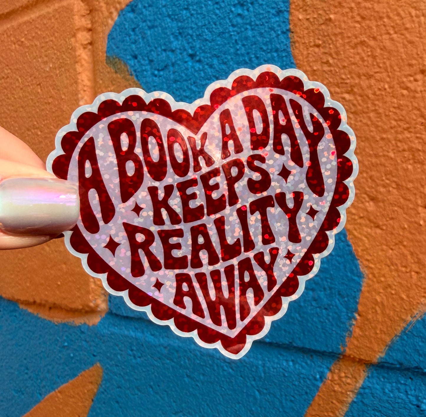 A Book A Day Keeps Reality Away Glitter Sticker