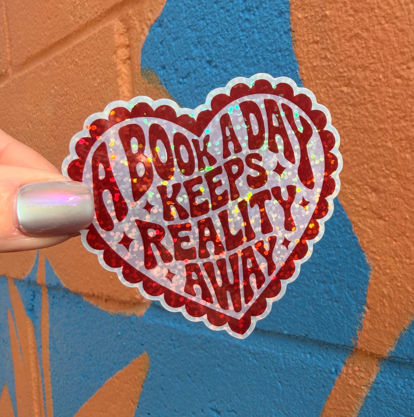 A Book A Day Keeps Reality Away Glitter Sticker