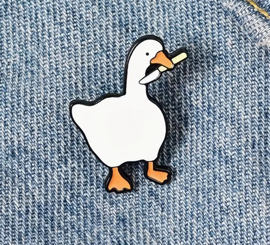 Load image into Gallery viewer, Duck With Knife Enamel Pin

