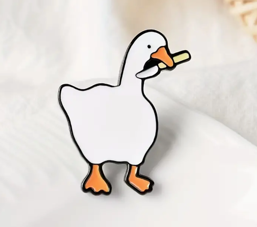 Load image into Gallery viewer, Duck With Knife Enamel Pin
