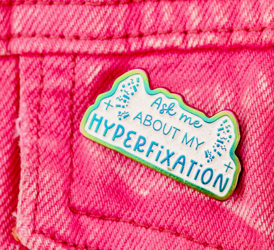 Ask Me About My Hyperfixation Rainbow Glitter Pin