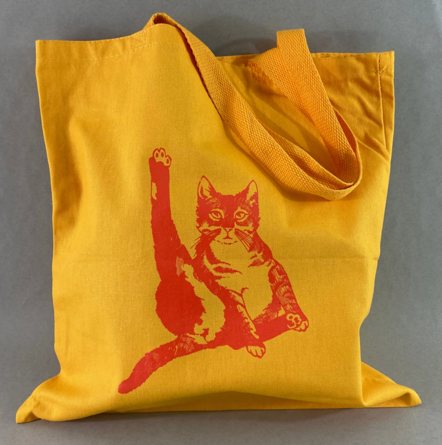 Cat Plays Violin Tote Bag