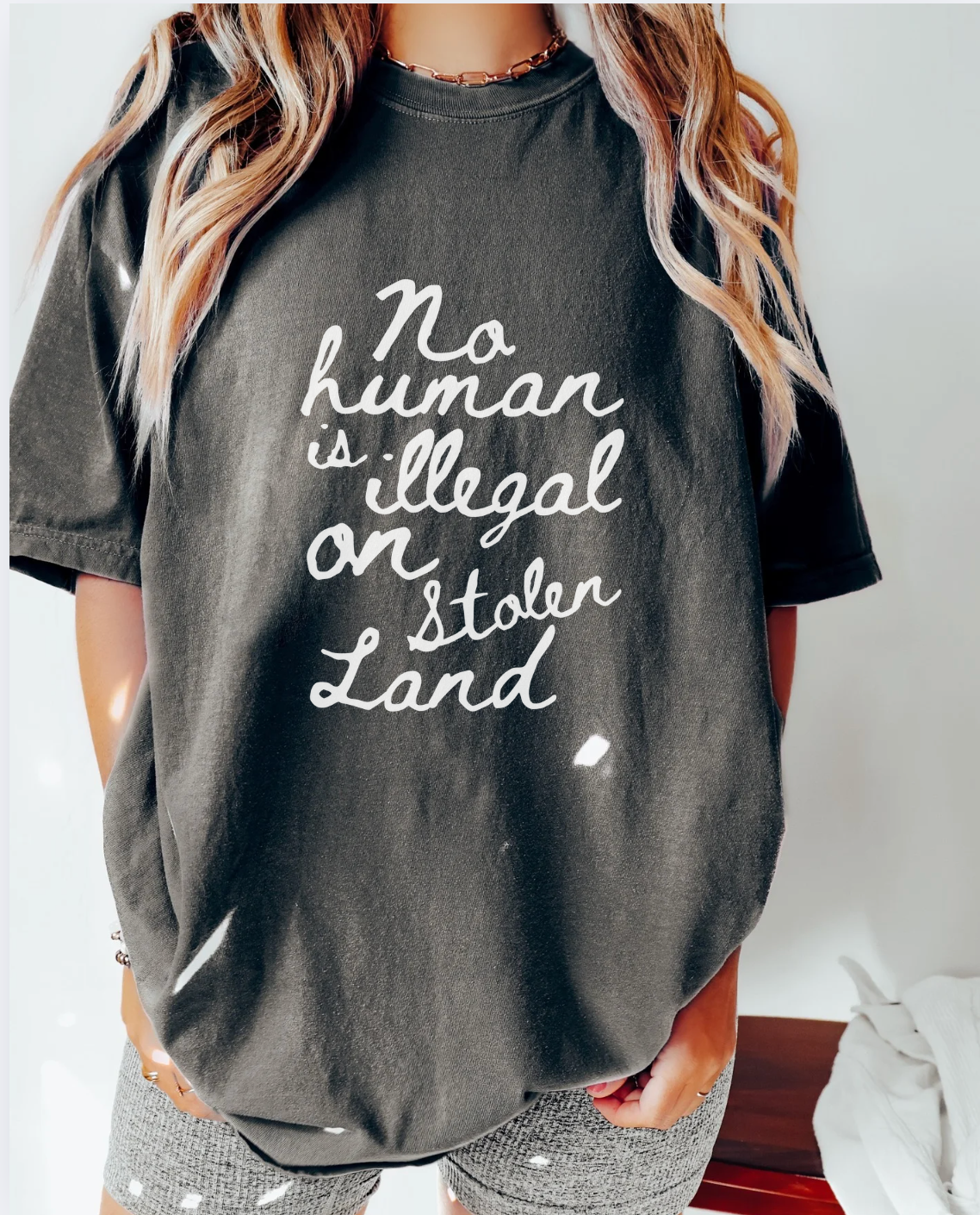 No Human Is Illegal On Stolen Land Unisex Tee