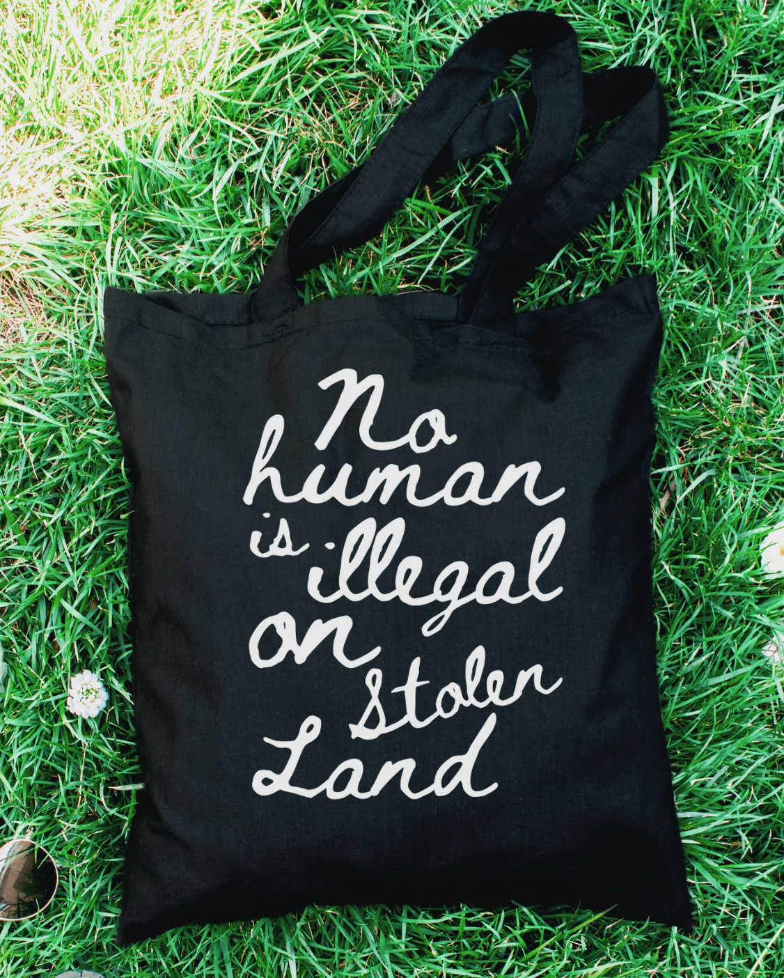 No Human Is Illegal On Stolen Land Tote Bag