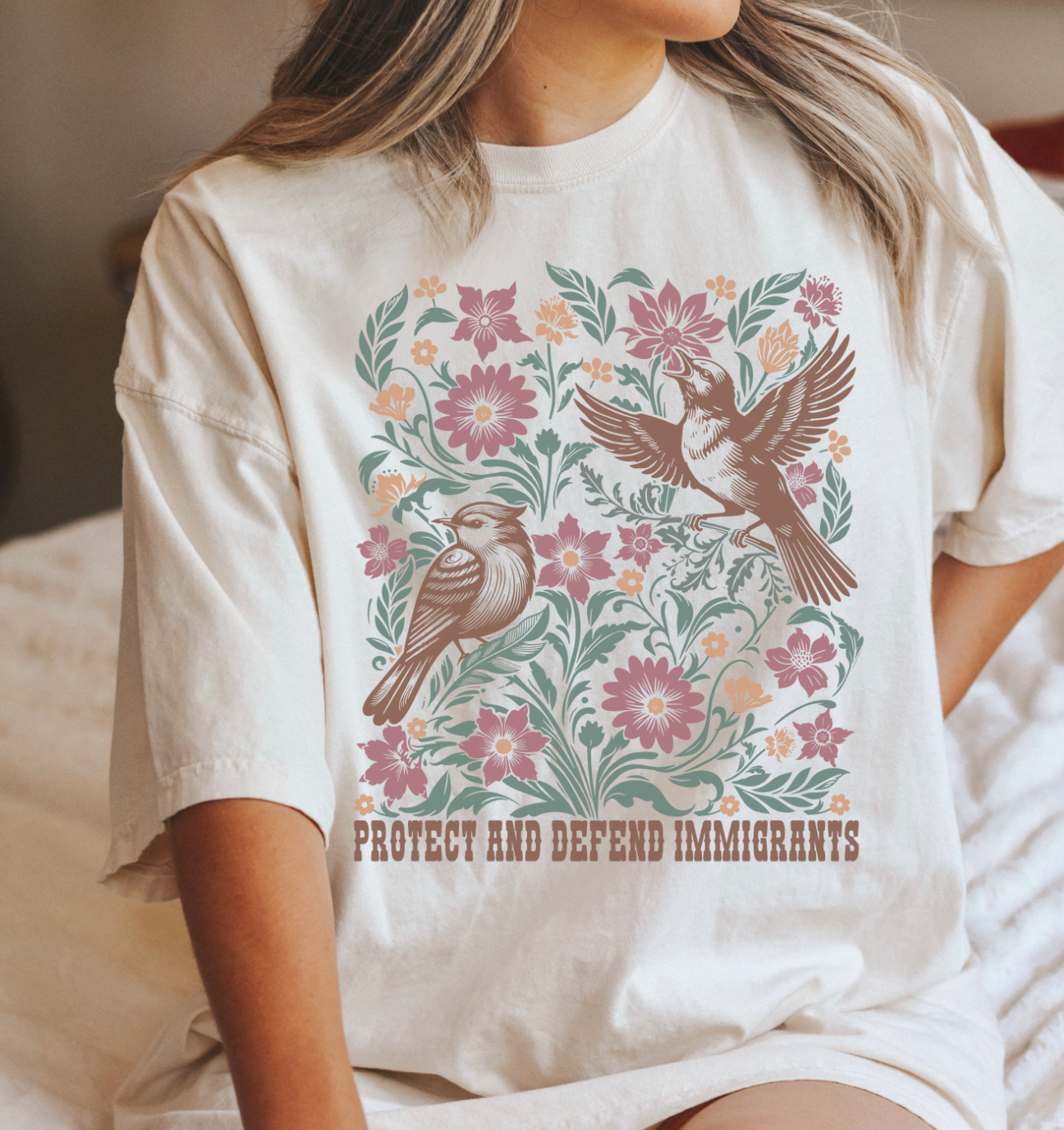Protect And Defend Immigrants Unisex Tee