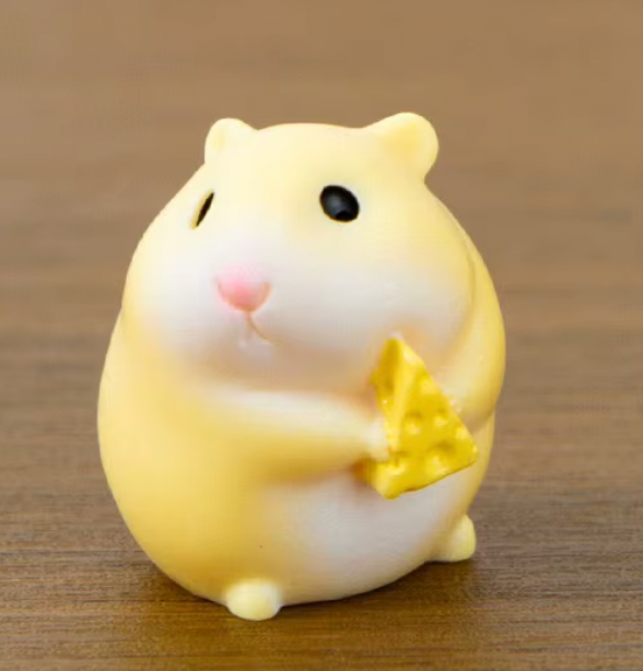 Tiny Cheese-Loving Hamster Figurine (Surprise Pull)