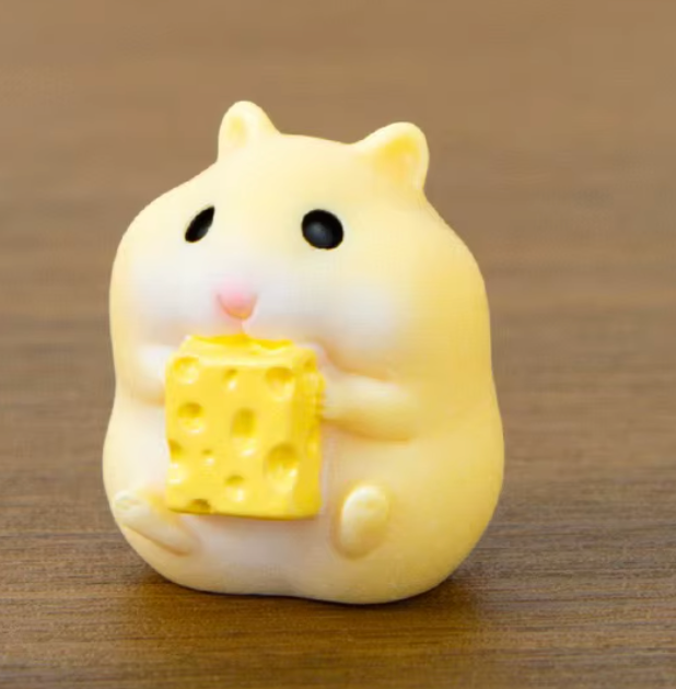 Tiny Cheese-Loving Hamster Figurine (Surprise Pull)