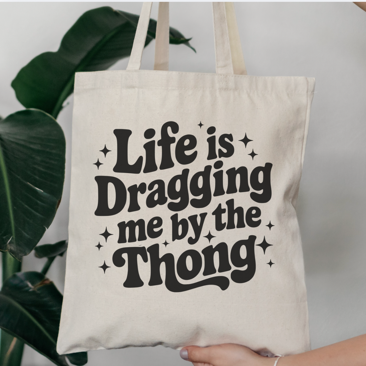 Life Is Dragging Me By The Thong Tote Bag